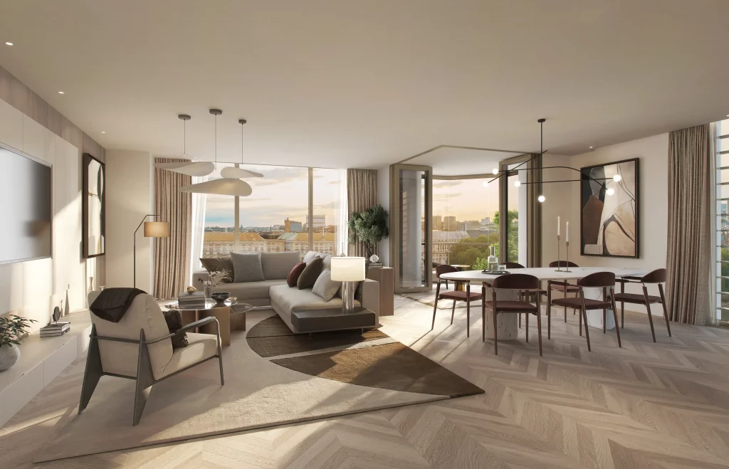 A bright and airy living room features modern furniture in neutral tones, complemented by a herringbone wood floor. Large windows offer views of a cityscape, enhancing the space's open feel.