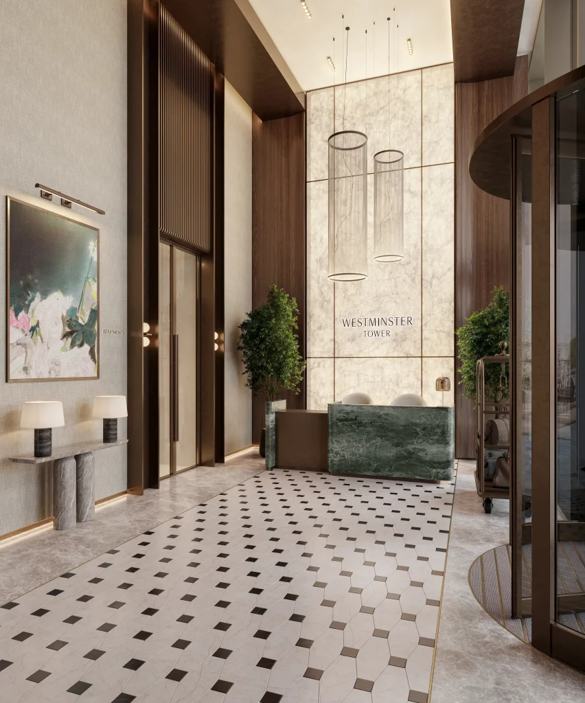 Elegant hotel lobby interior with high ceilings, modern lighting, and a marble reception desk. "Westminster Tower" is printed on the wall behind the desk.